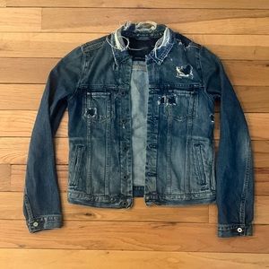Ripped jean jacket